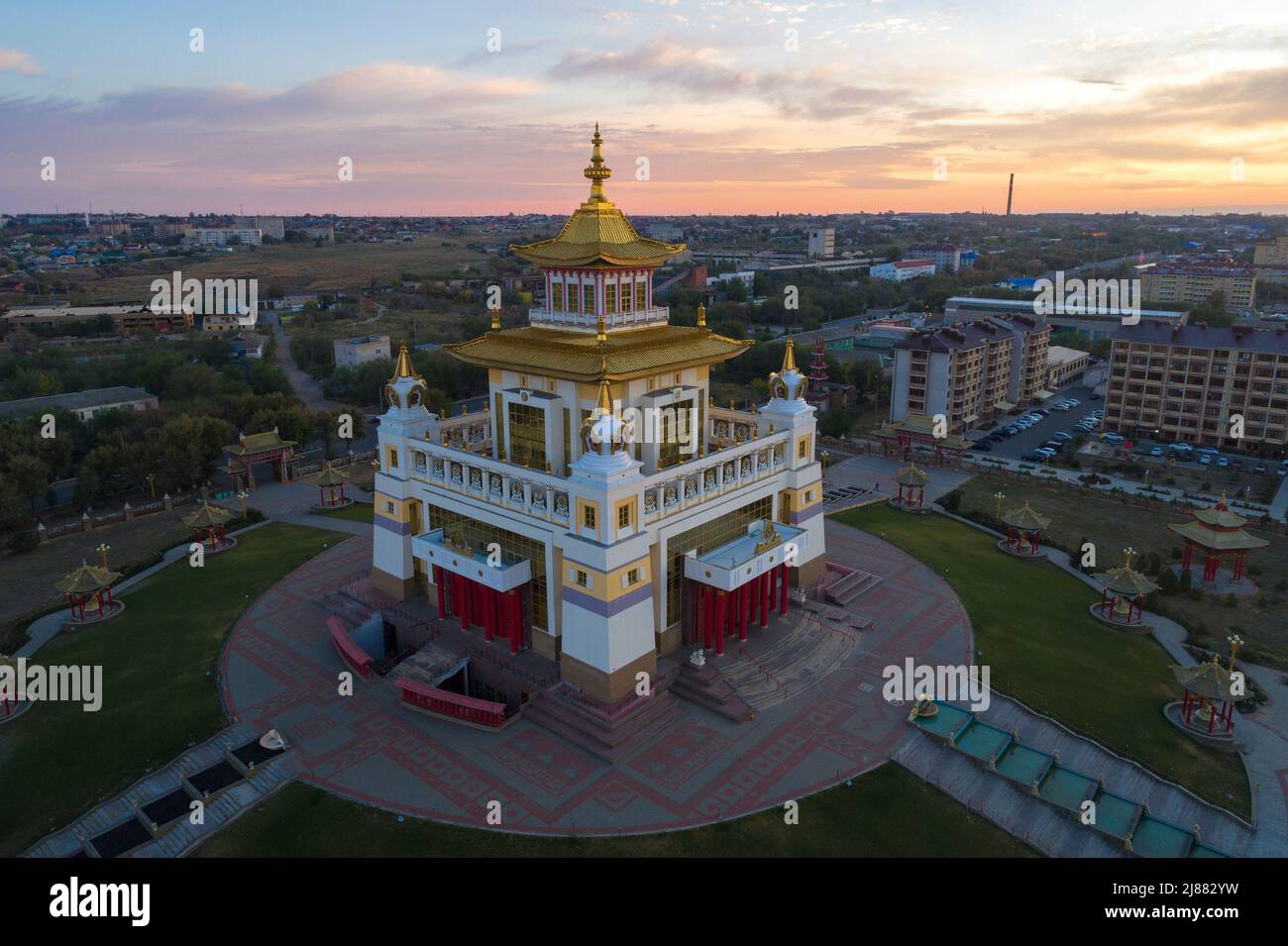 Buddhist Temple 'Golden Abode of Buddha Shakyamuni' against the backdrop of the September dawn (aerial view). Elista. Republic of Kalmykia, Russia Stock Photo