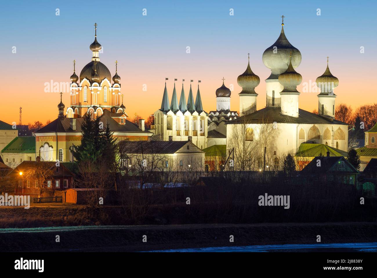 Tikhvin Theotokos Assumption Monastery in the night iaccent lighting on a December evening. Leningrad Region, Russia Stock Photo