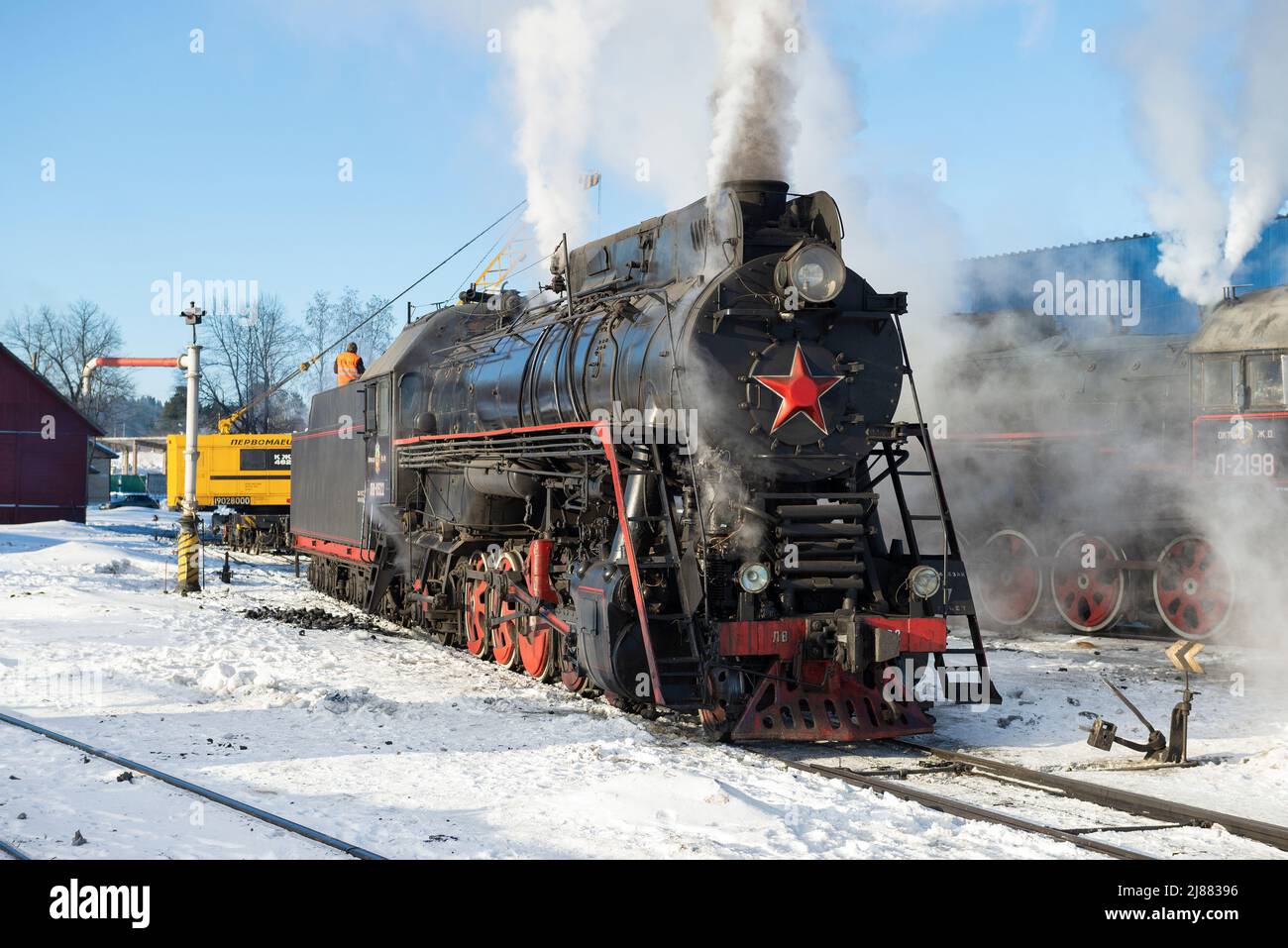 SORTAVALA, RUSSIA - MARCH 10, 2021: The last working Soviet steam locomotive of the 'LV' series at the Sortavala station on a sunny March morning Stock Photo