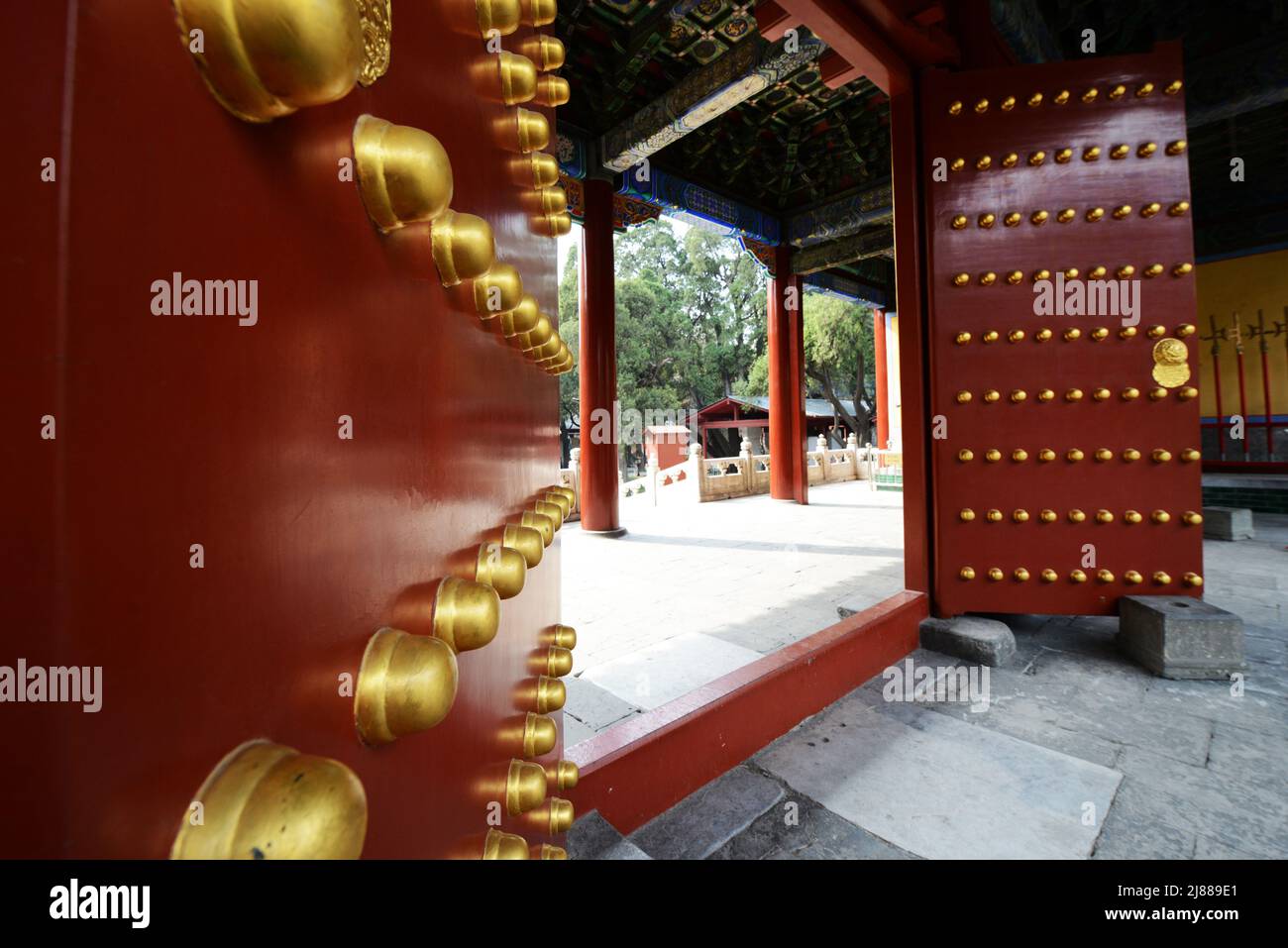 Colorful giant doors at the entrance of the Temple of Confucius in Beijing, China. Stock Photo