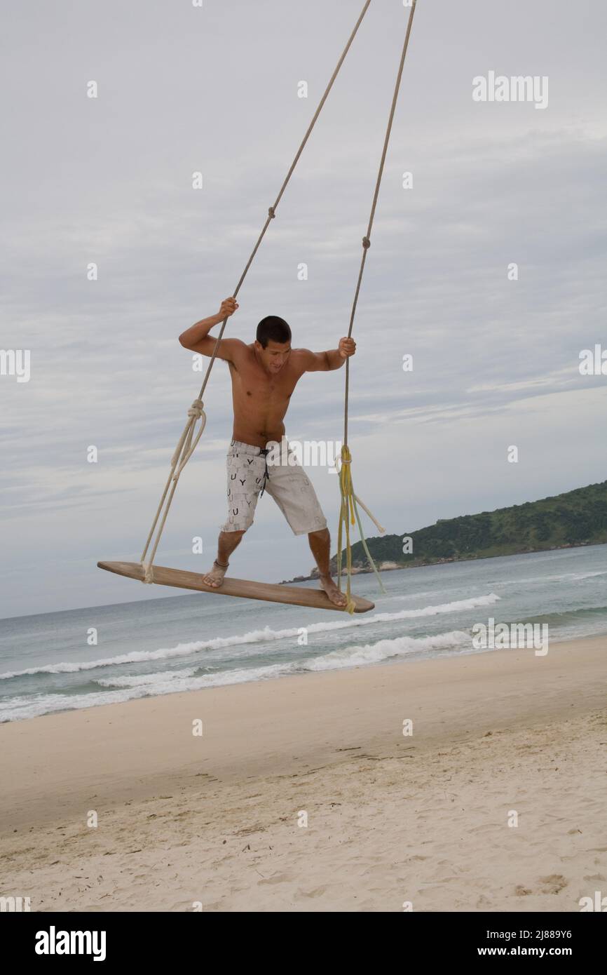 The surf swin on Praia do Rosa beach near Vida Sol e Mar Eco Resort, Santa Catarina, Brazil Stock Photo