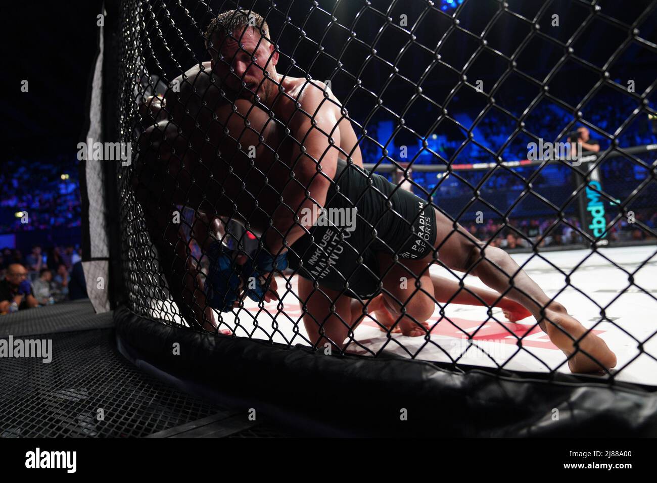 London, UK. 13th May, 2022. LONDON, ENGLAND - MAY 13: Michael “Venom” Page (red gloves) battles Logan Storley (blue gloves) in their welterweight fight during the Bellator 281: MVP v Storley event at SSE Arena on May 13, 2022, in London, England, England. (Photo by Scott Garfitt/PxImages) Credit: Px Images/Alamy Live News Stock Photo