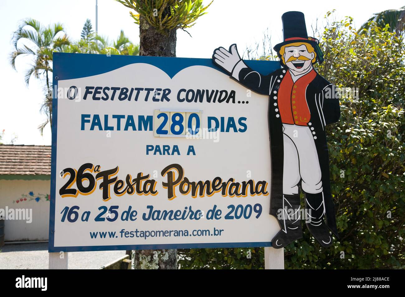 Sign listing how many days until the next annual week-long Pomeranian Festival in front of the Welcome Center in the German community of Pomerode in S Stock Photo