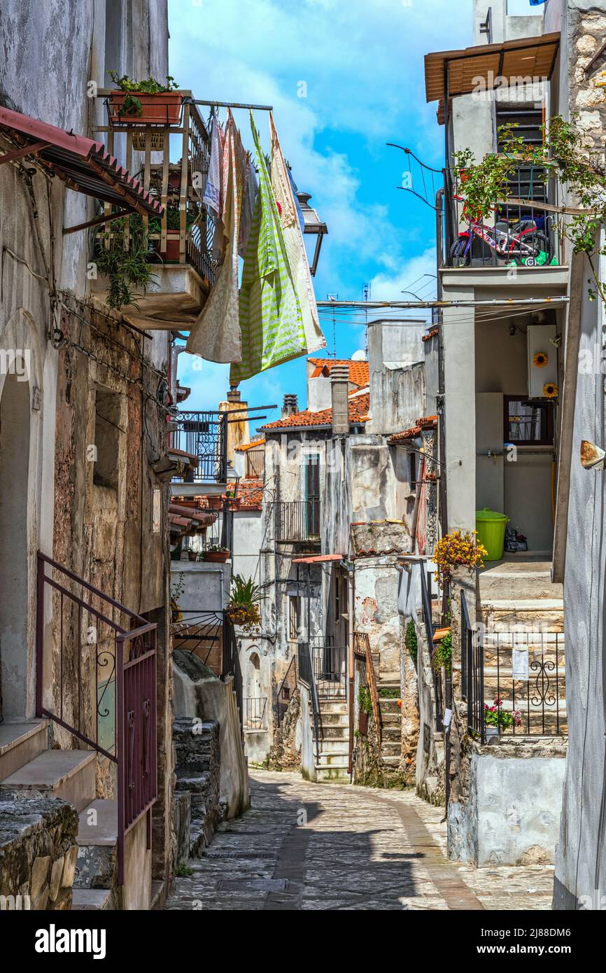Clothes hanging out to dry through the old and ancient alleys of the medieval village of Vico del Gargano. Vico del Gargano, Foggia province, Puglia Stock Photo