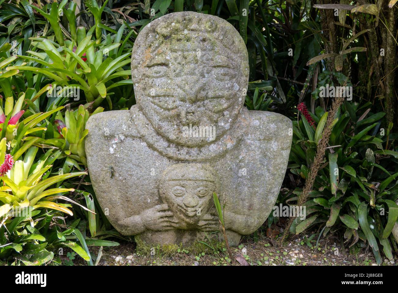 Stone carved statue in a garden. Colombia, South America. Stock Photo