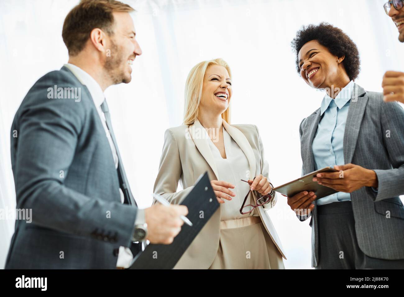 young business people meeting office teamwork group success corporate discussion Stock Photo