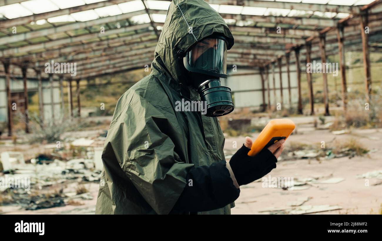 man with geiger counter in radioactive site Stock Photo - Alamy