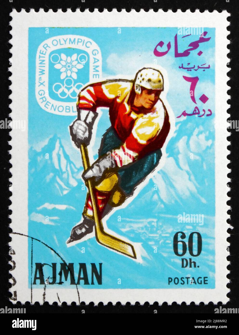 AJMAN - CIRCA 1967: a stamp printed in the Ajman shows Ice Hockey, Winter Olympics 68, Grenoble, circa 1967 Stock Photo
