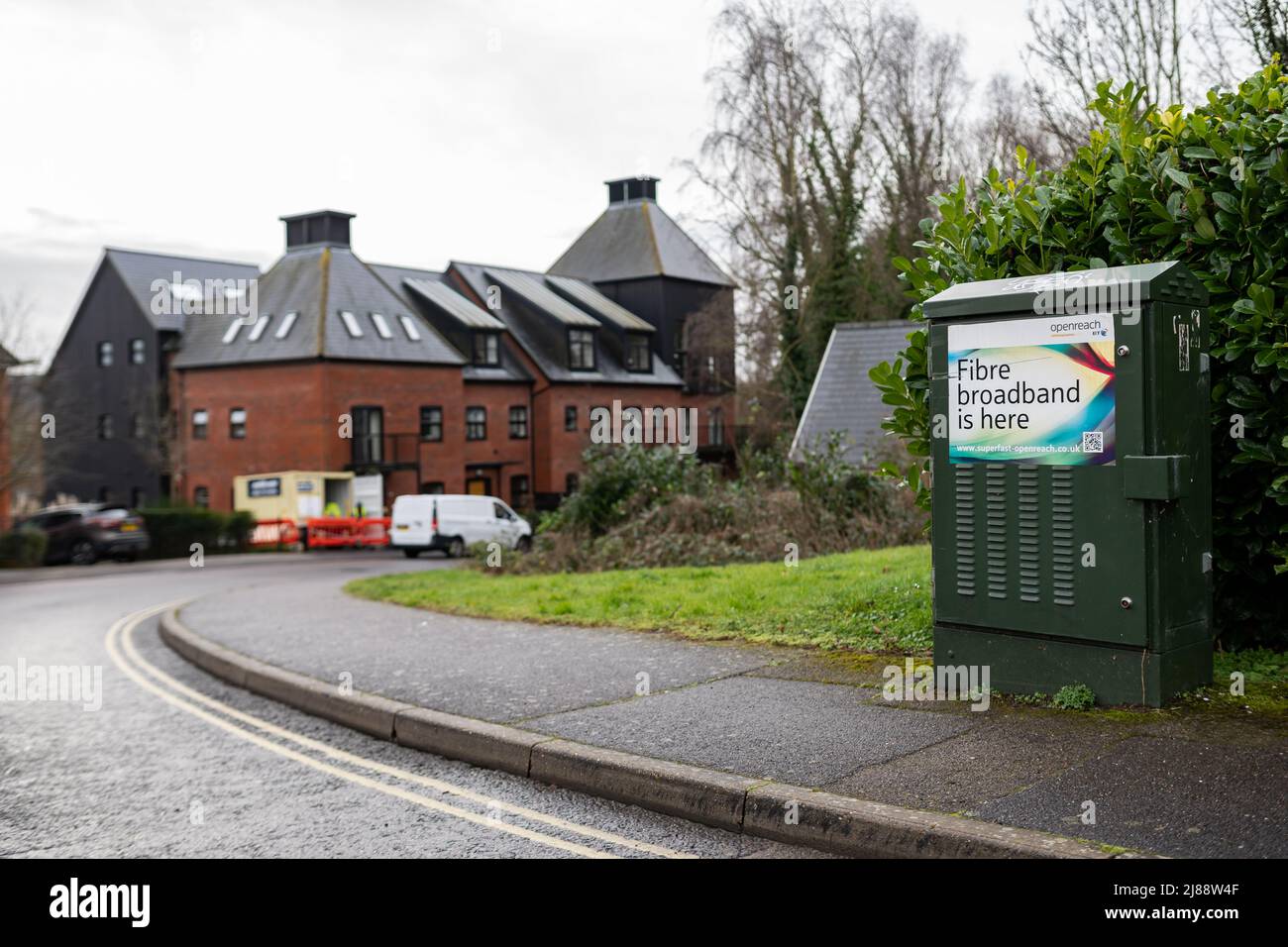 Woodbridge Suffolk UK February 22 2022: A green telecom cabinet advertising the release of fibre broadband in the area Stock Photo