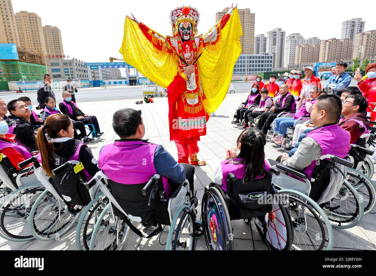 ZHANGYE, CHINA MAY 14, 2022 People with disabilities watch