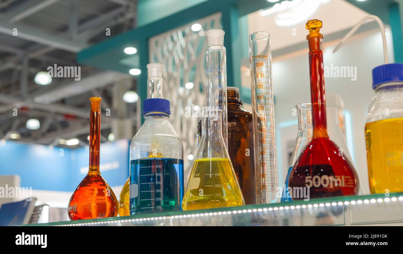 Close up: medical empty glass bottles in showcase at pharmaceutical exhibition Stock Photo