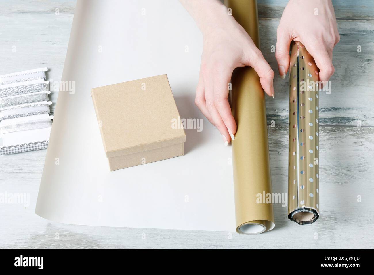 How to wrap and decorate christmas gift. Step by step, tutorial Stock Photo Alamy