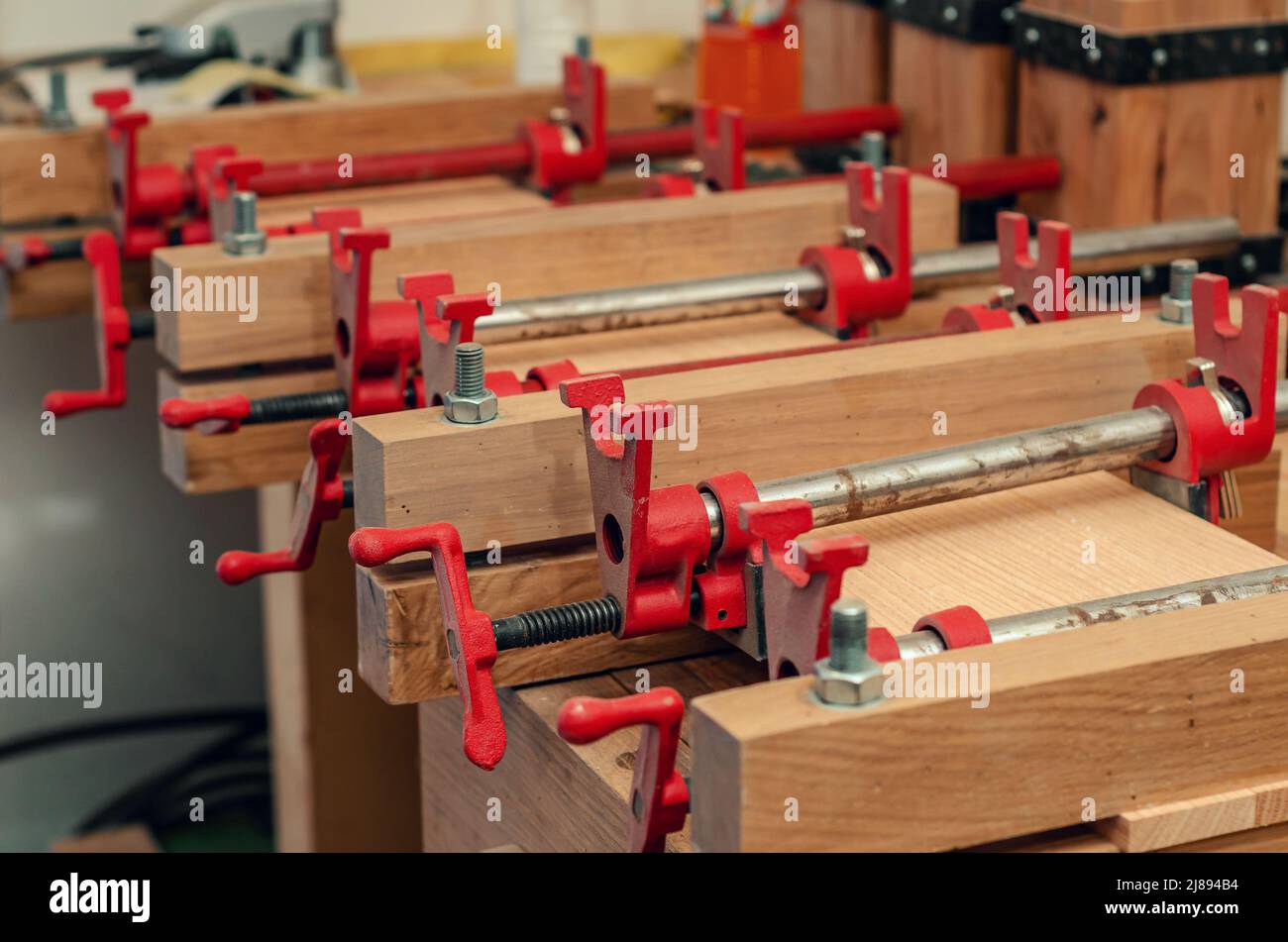 Wooden boards with clips. Joinery production. Woodworking Stock Photo Alamy