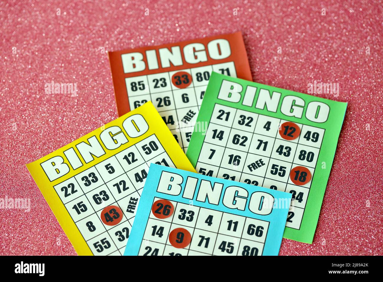 Many colorful bingo boards or playing cards for winning chips. Classic
