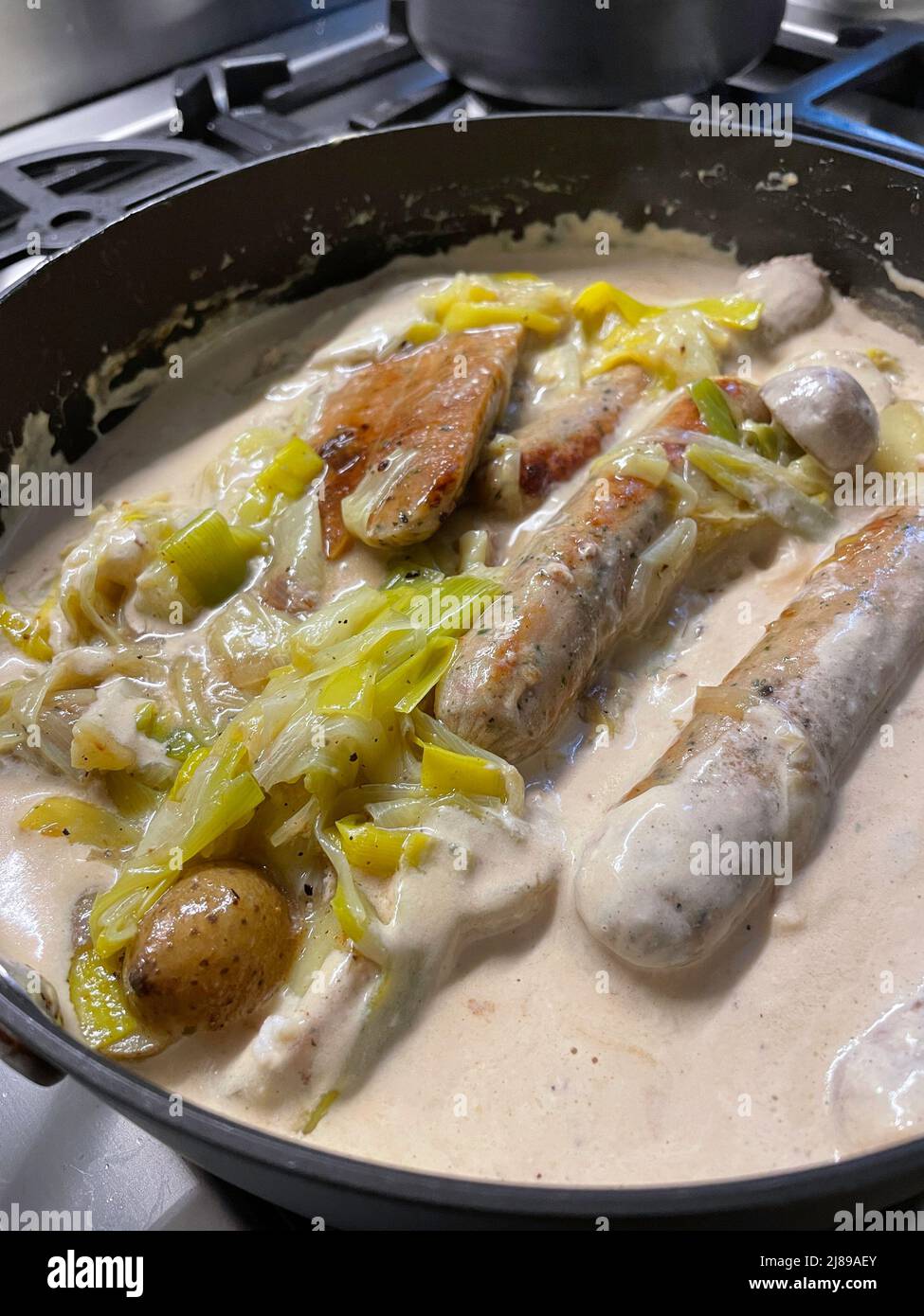 Bangers Cooking on a Home Stovetop, USA, 2022 Stock Photo