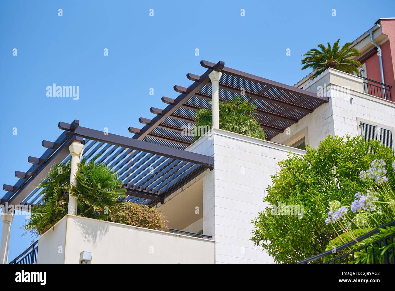 Pergola above the balcony in a modern house Stock Photo Alamy