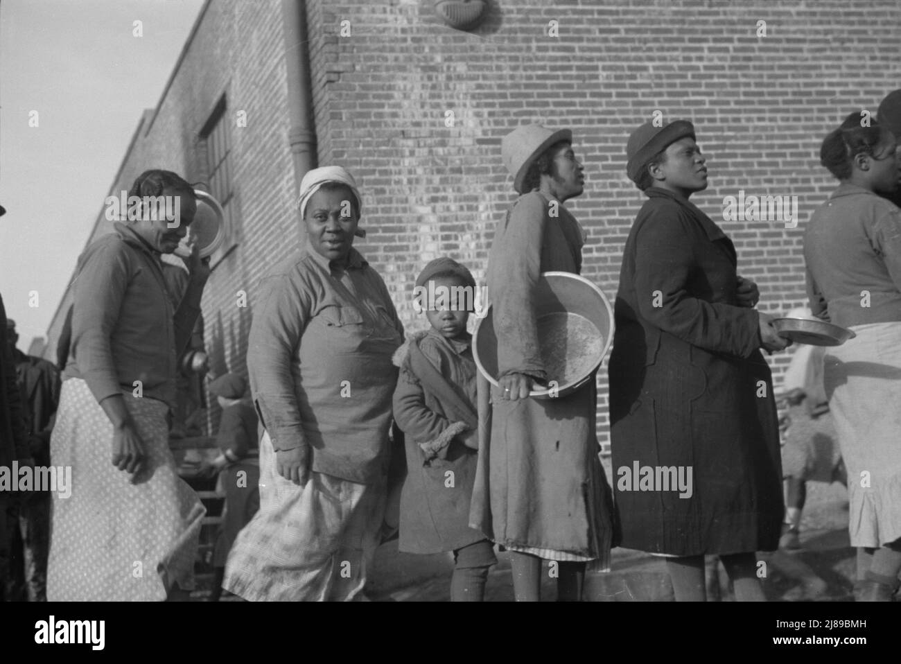 [Untitled photo, possibly related to Negroes in the lineup for food at