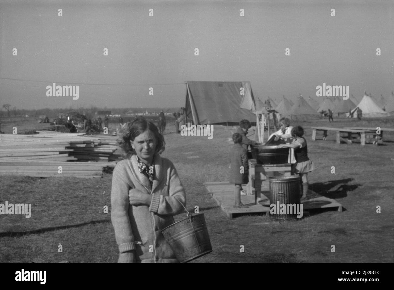 [Untitled photo, possibly related to: Facilities for washing in the camp for white flood refugees at Forrest City, Arkansas]. Stock Photo