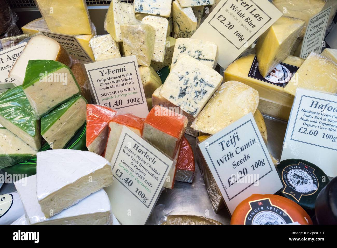 Cheese for Sale and an Old Cutter or Chopper Used for Slicing Cheeses in a  Market at Salzburg Stock Image - Image of court, industry: 88882183