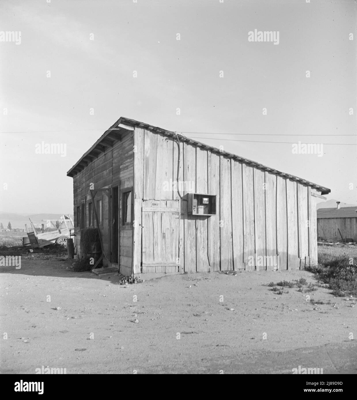 Cabin which rents for ten dollars a month in Arkansawyer's auto camp. Greenfield, California. Stock Photo