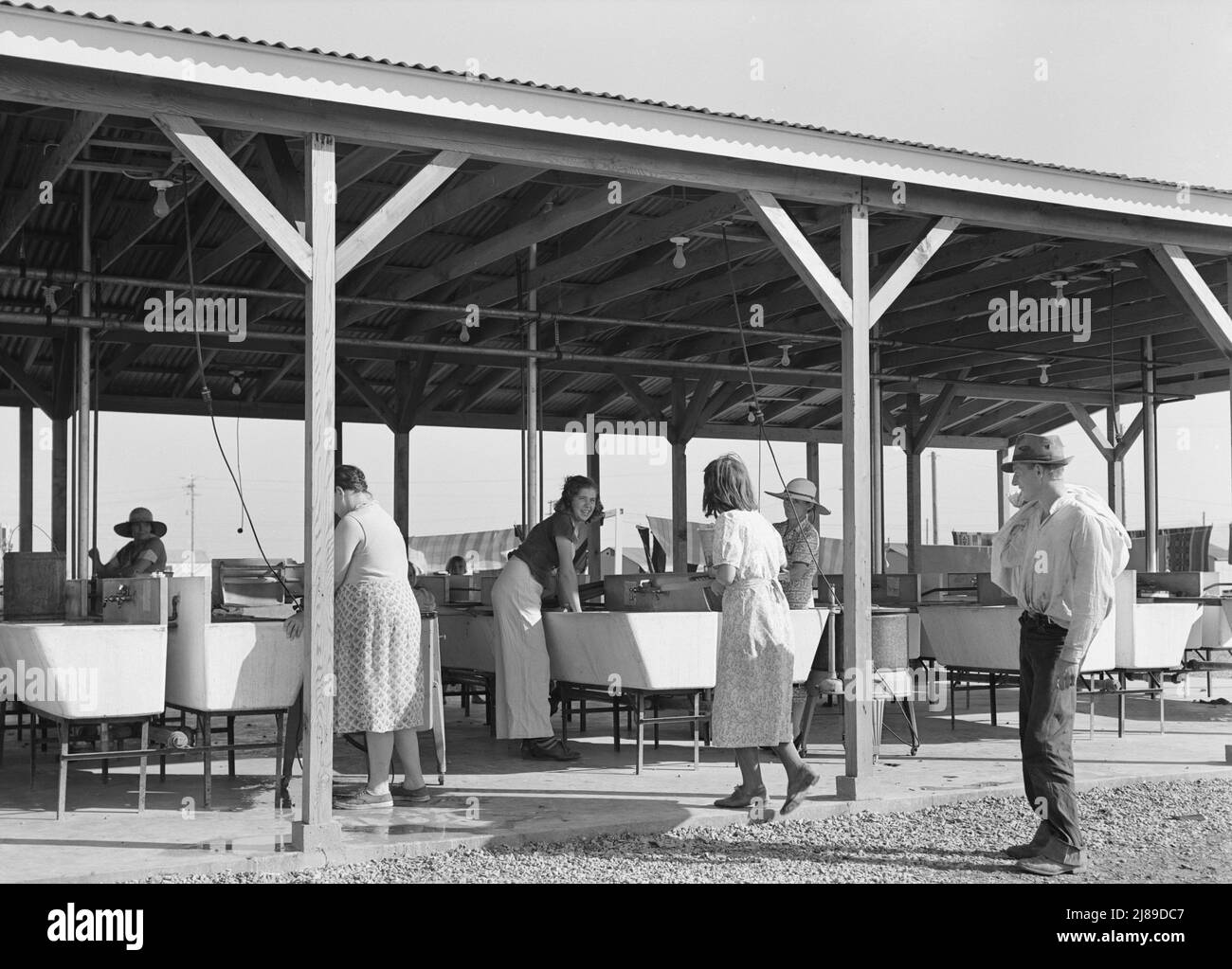 Laundry facilities for migratory workers in Farm Security Administration (FSA) camp at Westley, California. Stock Photo