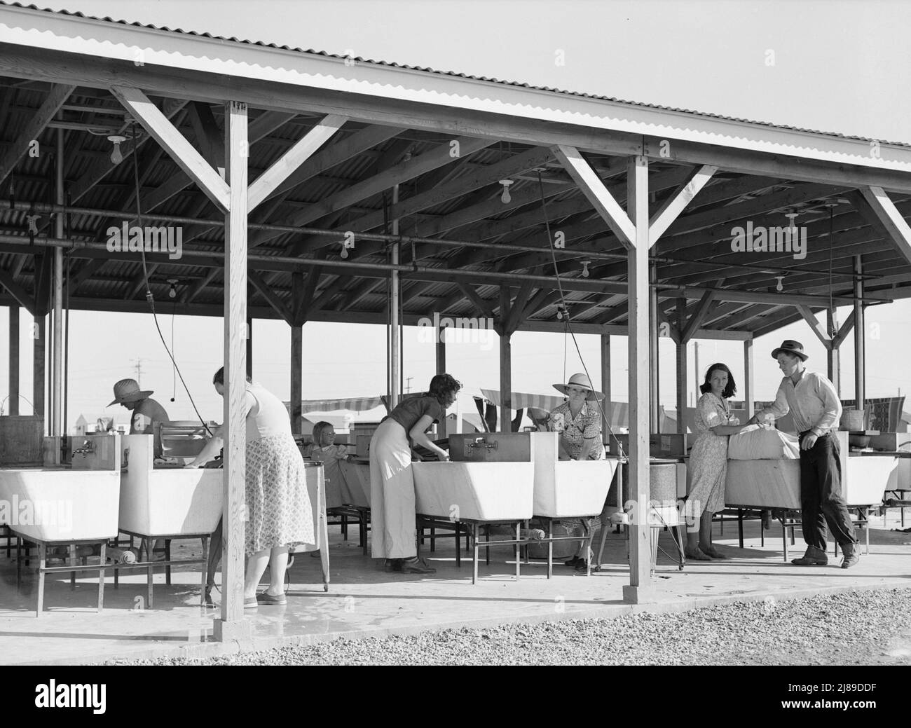 Laundry facilities in Farm Security Administration (FSA) camp for migrant labor. Westley, California. Stock Photo