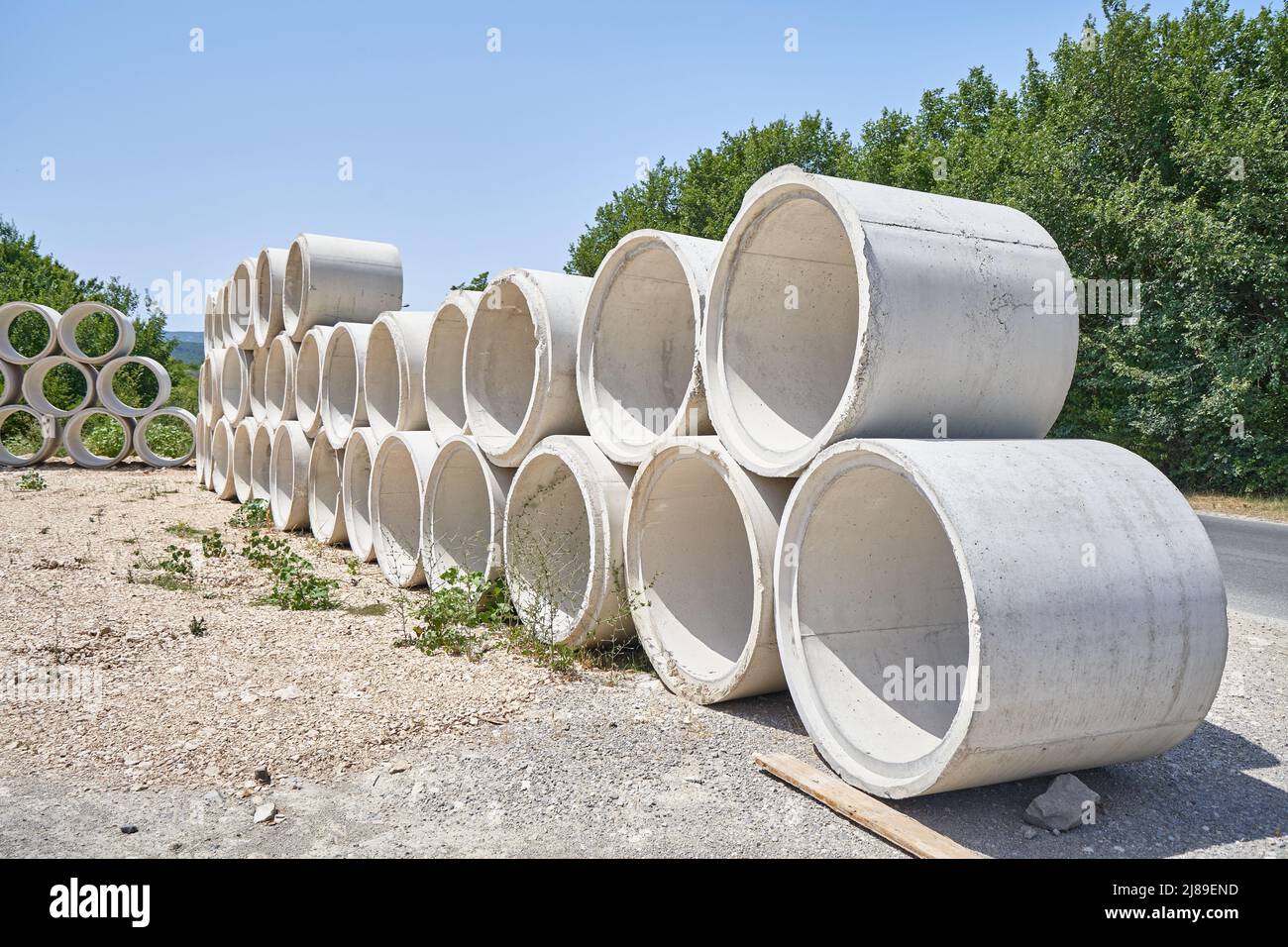 Concrete reinforced drainage pipe for septic system and wells Stock Photo