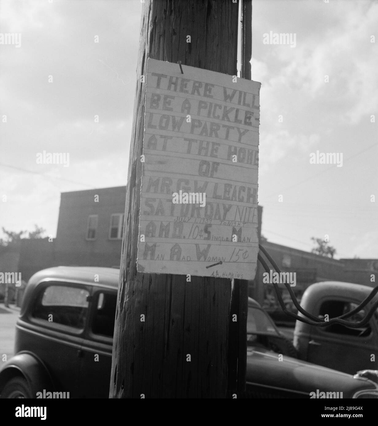 Sign tacked to pole near the post office. Main street, Pittsboro, North