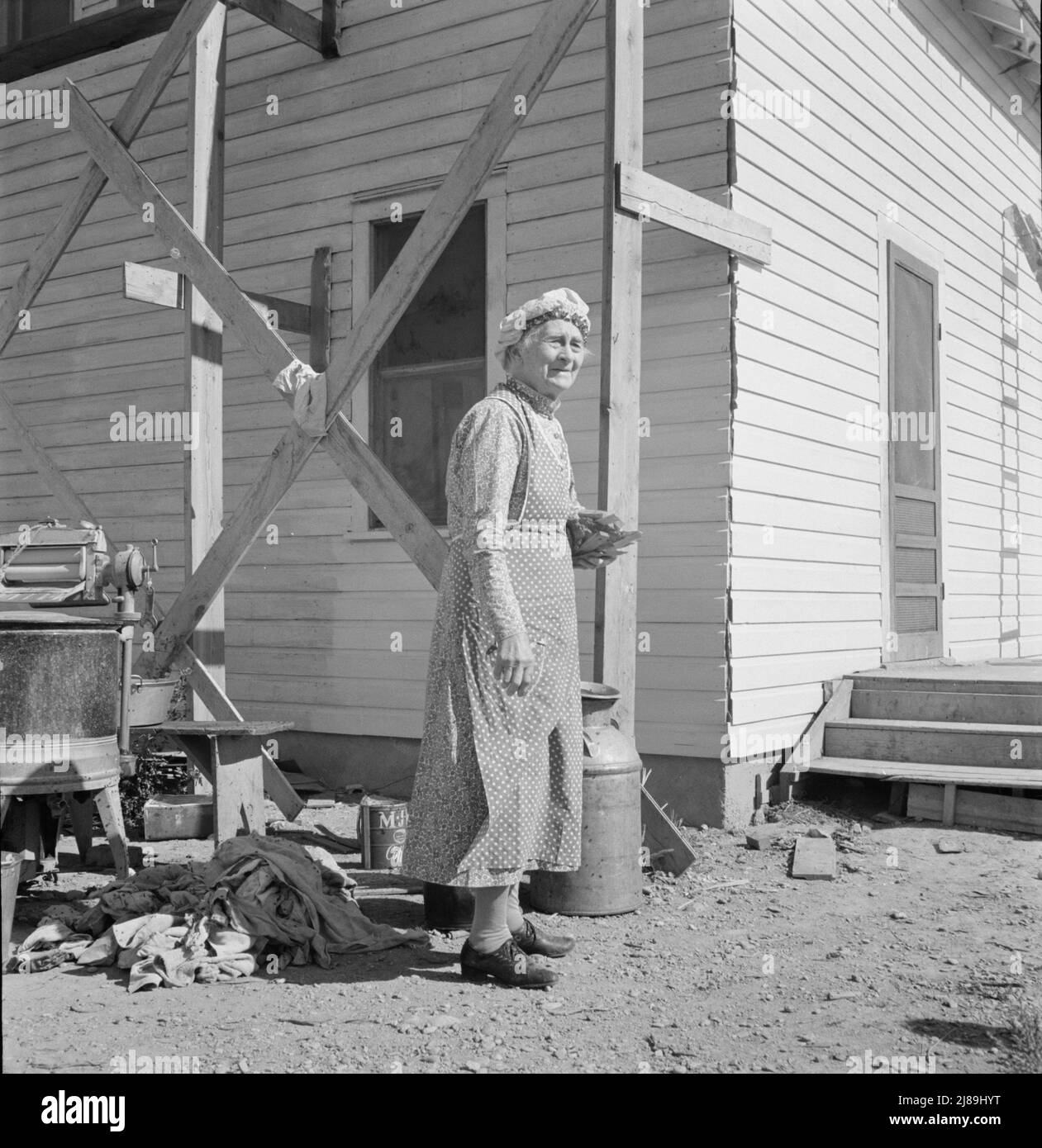 Soper grandmother helps the large family. Willow Creek area, Malheur County, Oregon. Stock Photo