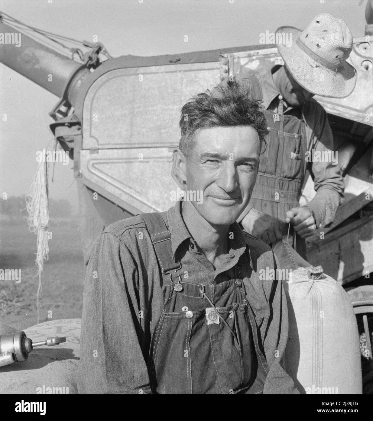 Oklahoman, worked three years as farm laborer, starts next year on his own place. Quit school after third day. Can neither read nor write. Is &quot;best farm laborer&quot; this farmer ever had. Near Ontario, Malheur County, Oregon. Stock Photo