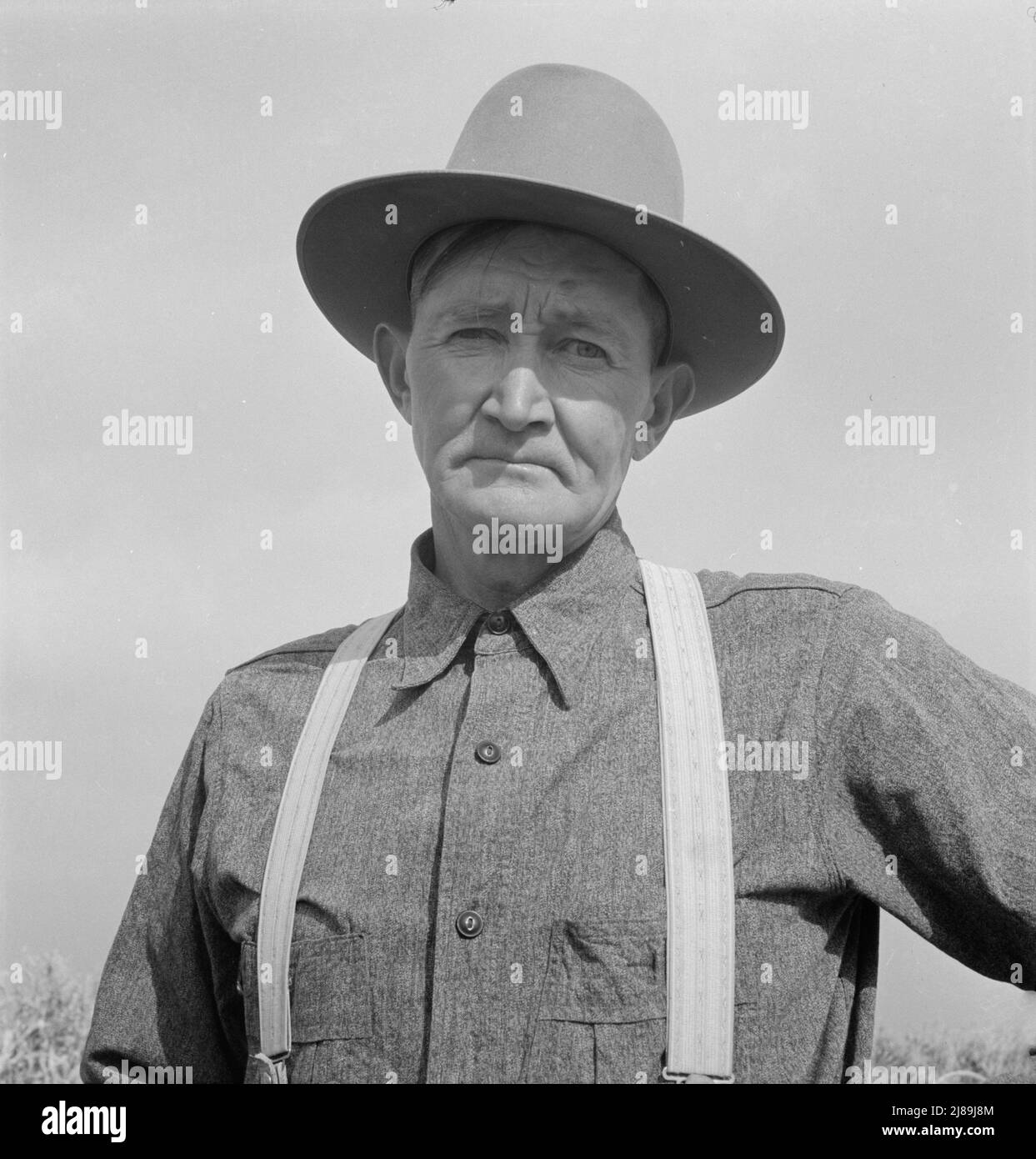 Mr. Wardlow, drought area farmer, adjusting to a Western farm. Dead Ox Flat, Malheur County, Oregon. Stock Photo