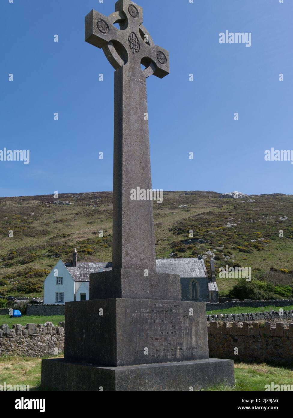 Large cross in Bardsey Island Abbey churchyard covering the remains of Baron Newborough who died in 1888 Gwynedd Wales UK Stock Photo