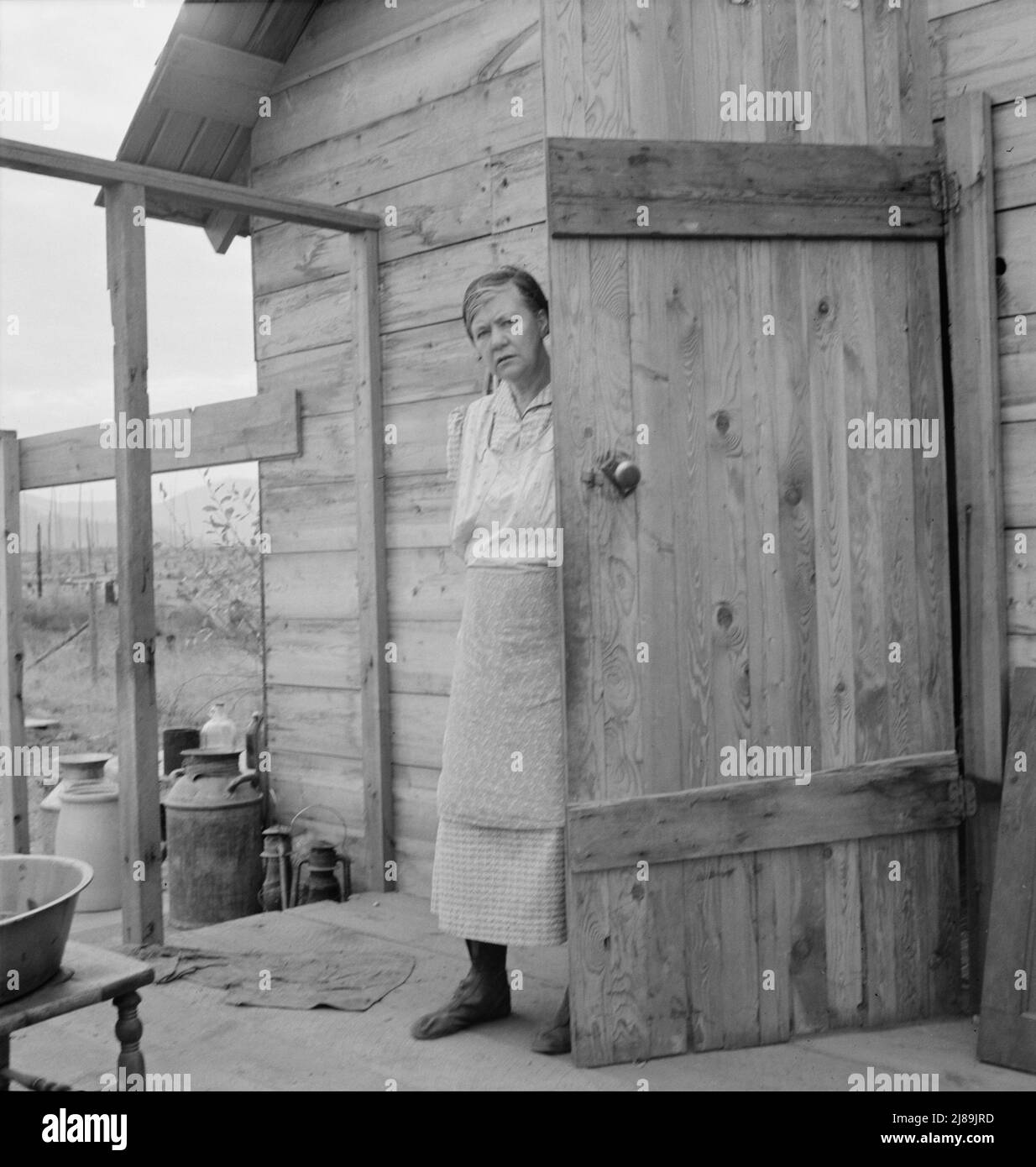 [Untitled, possibly related to: New settler shows fish he caught this morning. He &quot;likes it fine here.&quot; Priest River Valley, Bonner County, Idaho]. Stock Photo