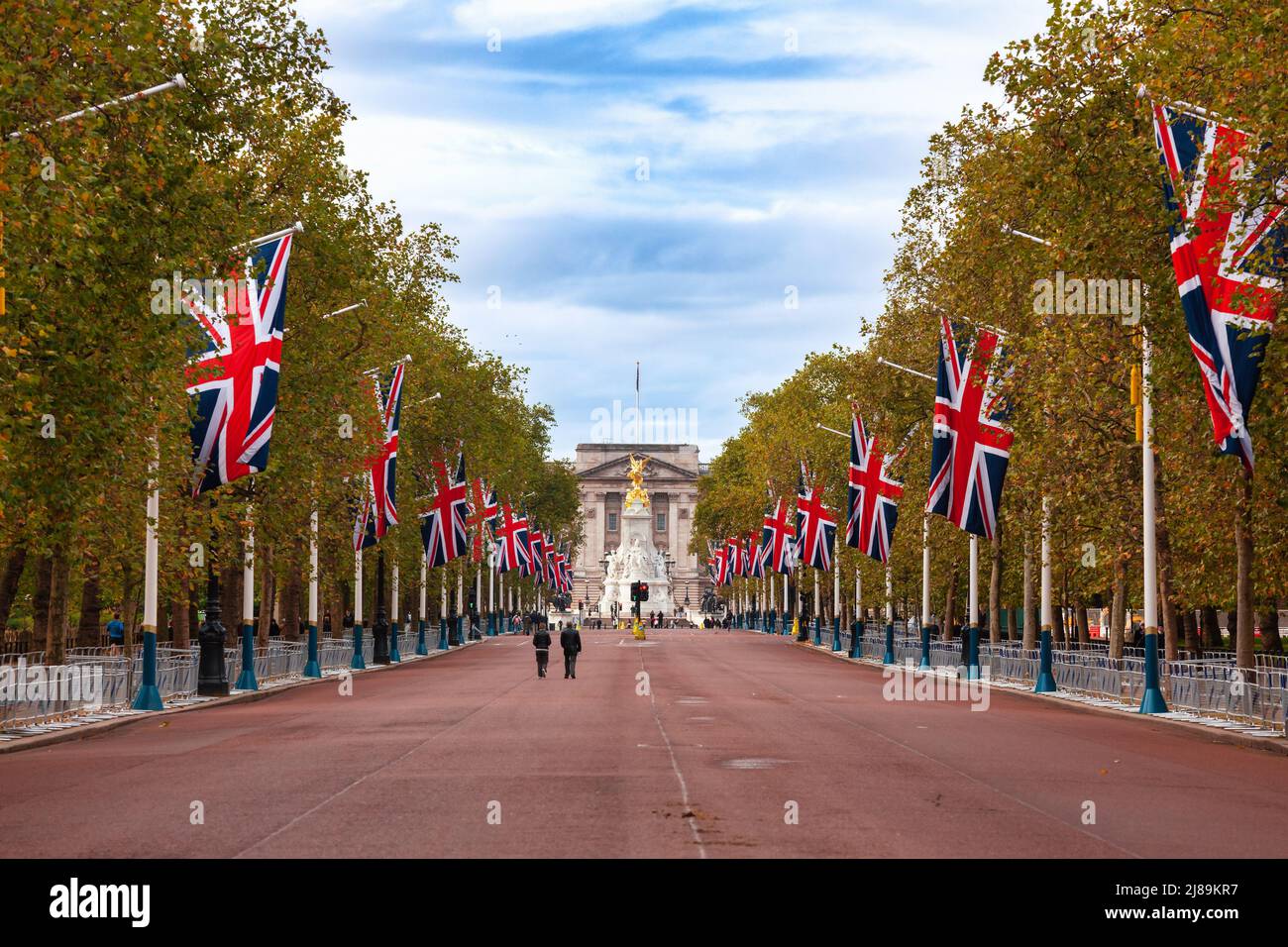 LONDON, UK - OCTOBER 28, 2012: A view along the Mall, the landmark ceremonial approach road to Buckingham Palace decorated with Union Jack flags Stock Photo