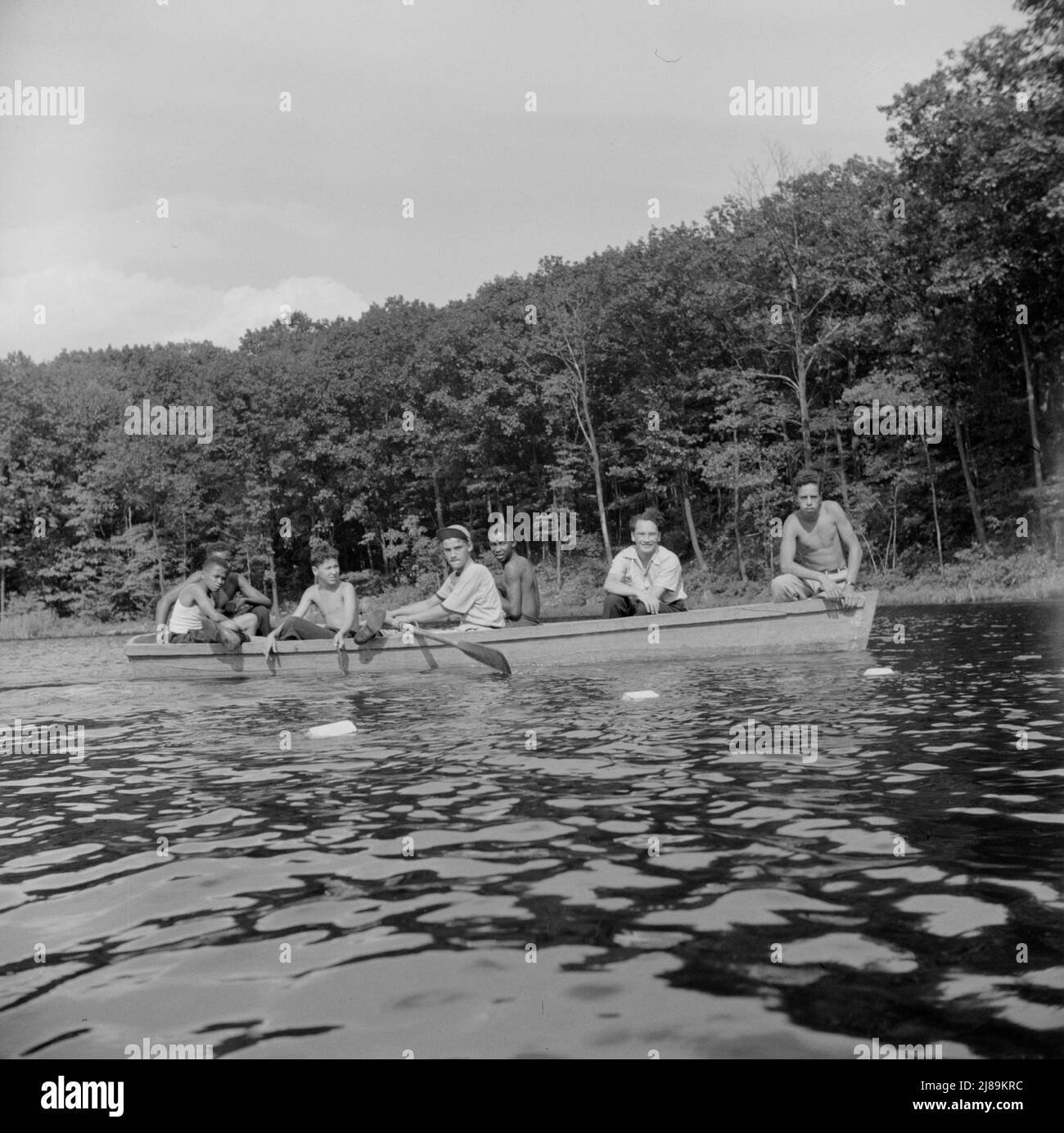 Southfields, New York. Interracial activities at Camp Nathan Hale, where children are aided by the Methodist Camp Service. Boating on the lake. Stock Photo