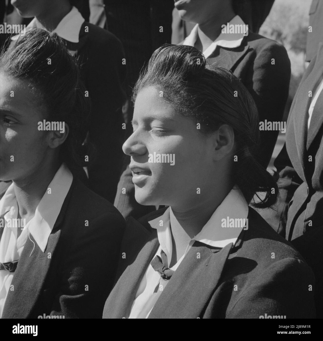 [Untitled photo, possibly related to: Daytona Beach, Florida. Bethune-Cookman College. Student choir singing on the campus]. Stock Photo