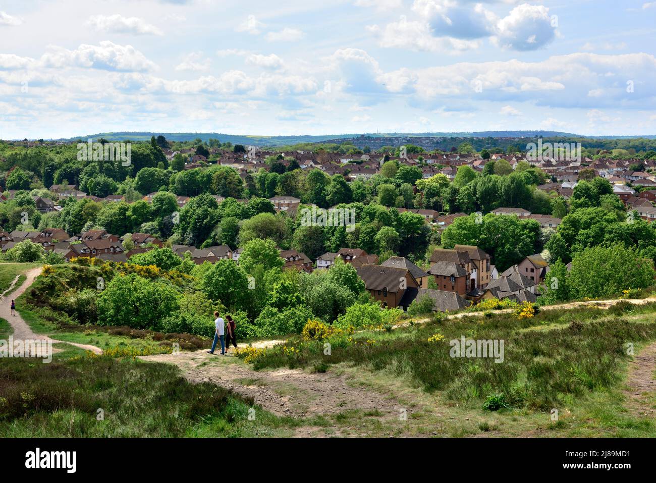 Looking south over trees and houses of Bristol from Troopers' Hill former mining area now park and nature reserve, UK Stock Photo