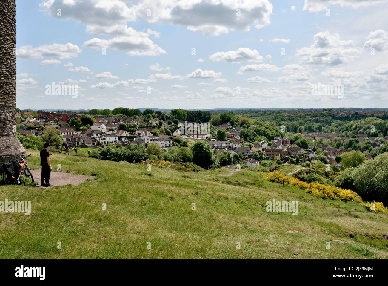 Looking south over trees and houses of Bristol from Troopers' Hill former mining area with remains of chimney now park and nature reserve, UK Stock Photo