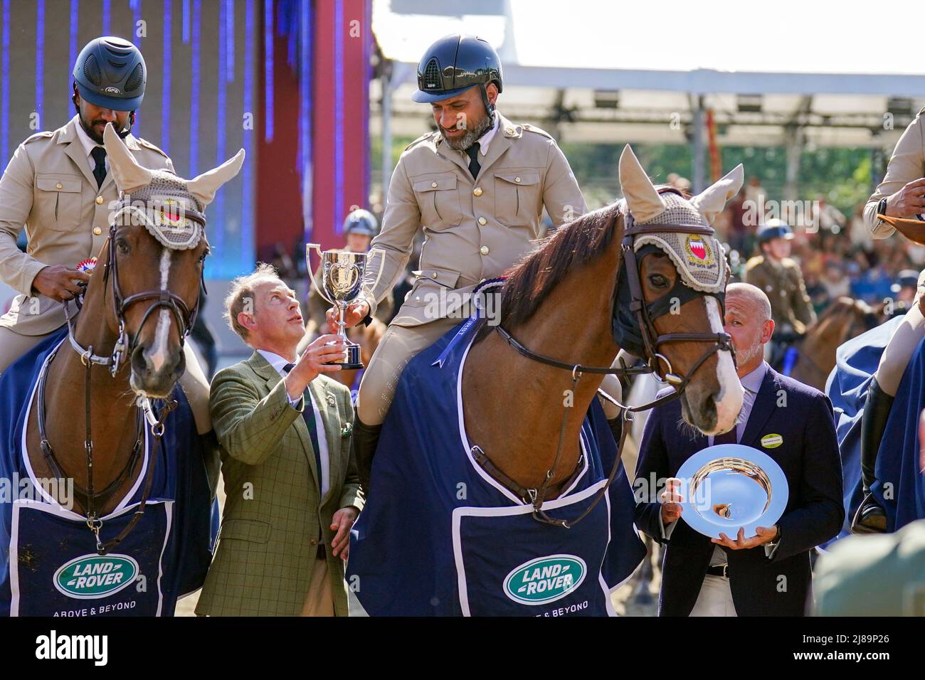 The Earl of Wessex presents the prizes for the Land Rover Services team