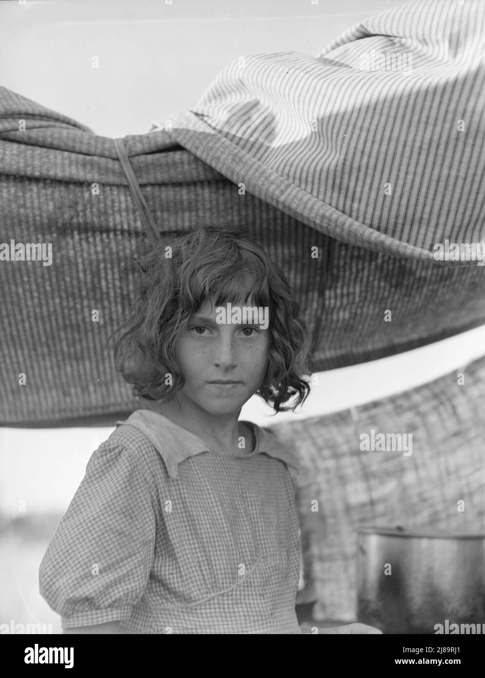 Migratory child in camp at end of day. Bean pickers' camp near West Stayton, Oregon. Stock Photo