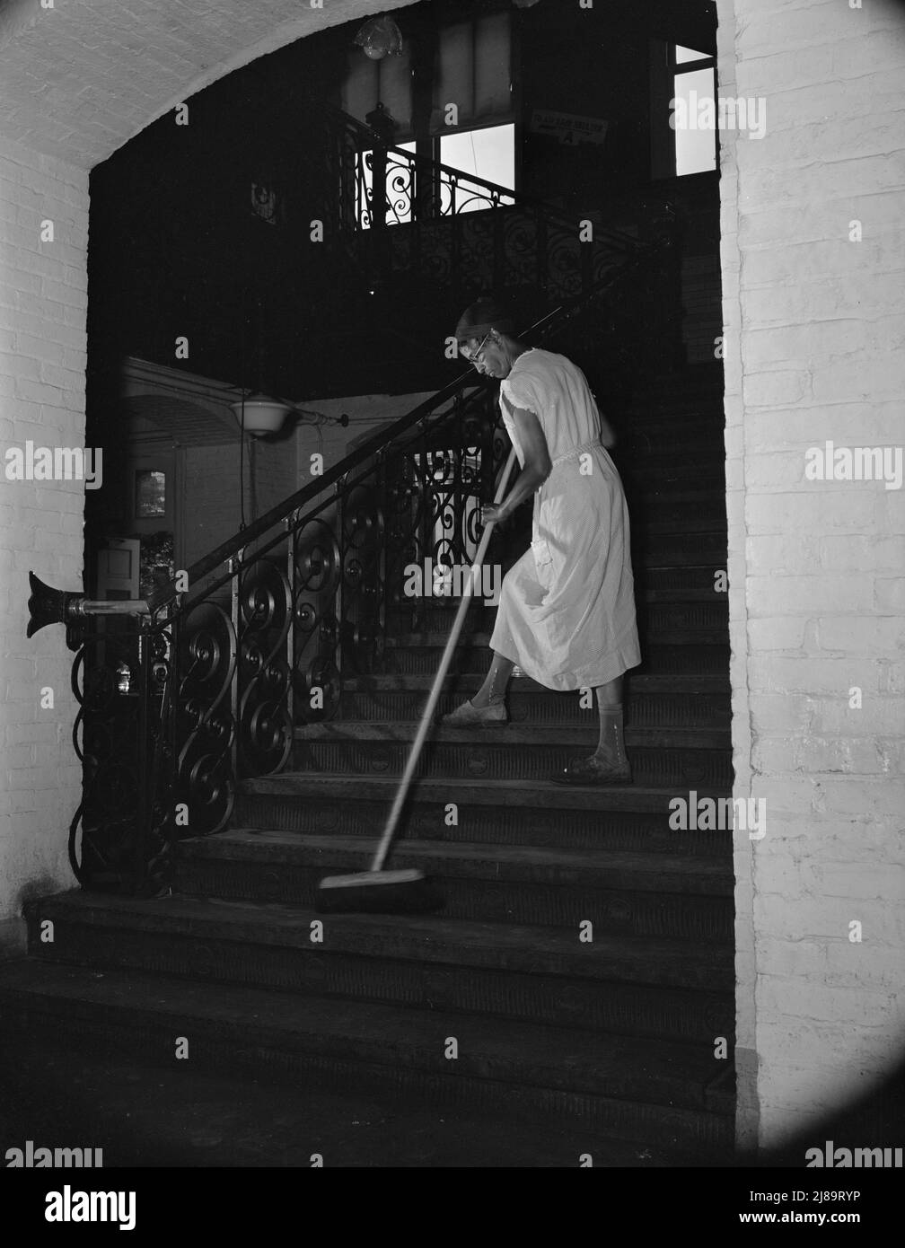 Washington d c government charwoman cleaning after regular working