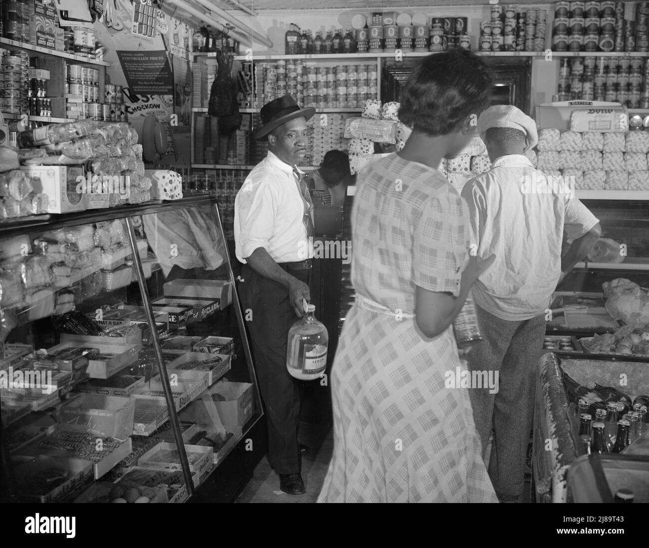 Washington, D.C. Interior of the grocery store patronized by Mrs. Ella Watson, a government charwoman. Stock Photo