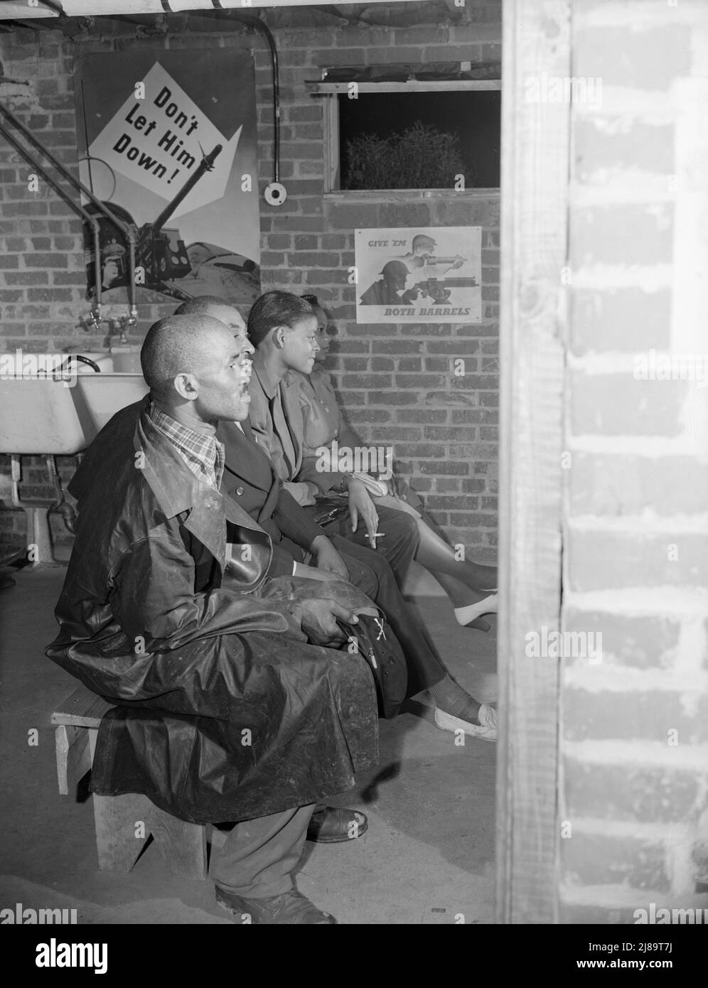 Washington, D.C. Air raid wardens' meeting in zone nine, Southwest area. Air raid wardens attending a meeting. Stock Photo
