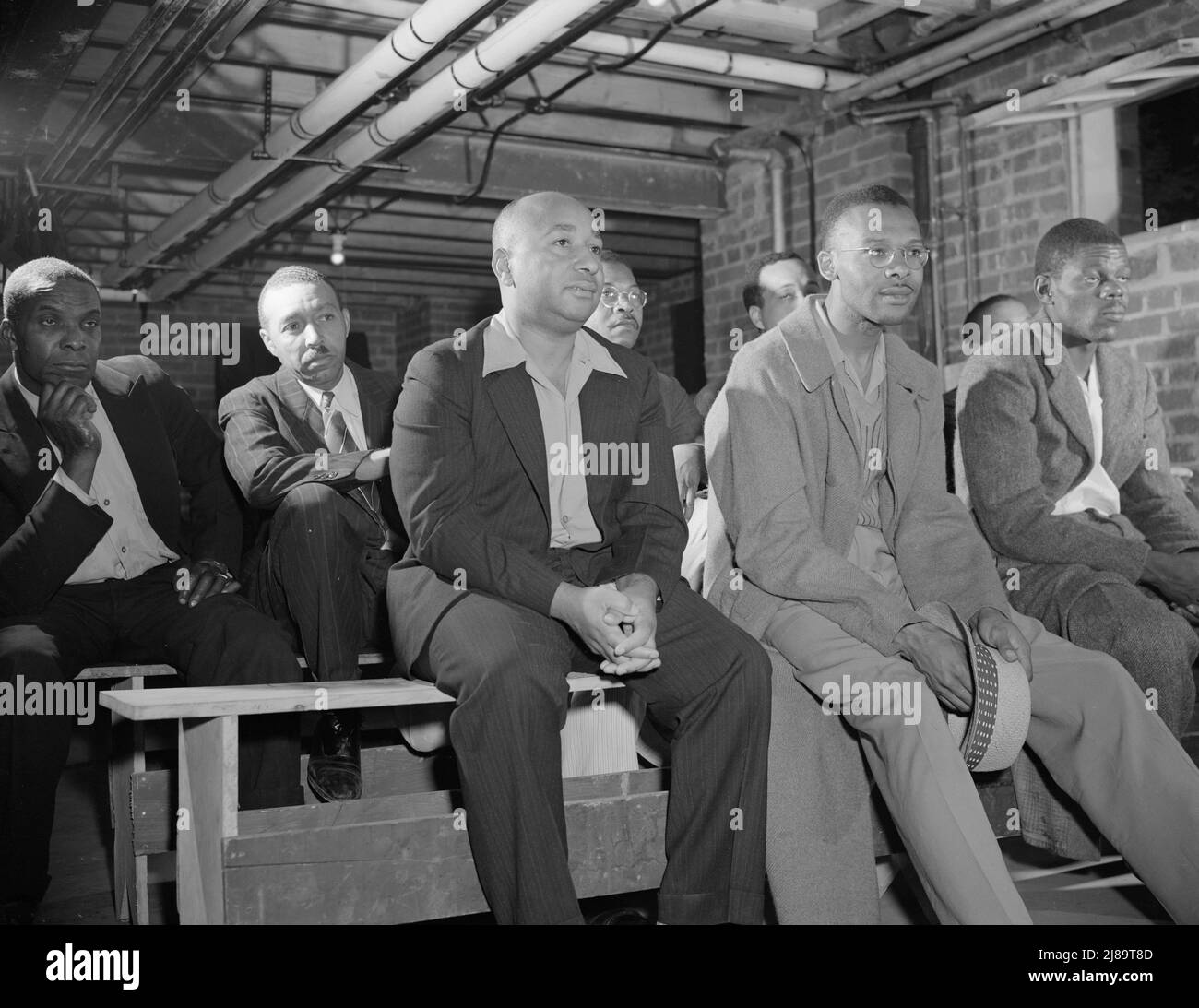 Washington, D.C. Air raid wardens' meeting in zone nine, Southwest area. Air raid wardens attending a meeting in their headquarters. Stock Photo