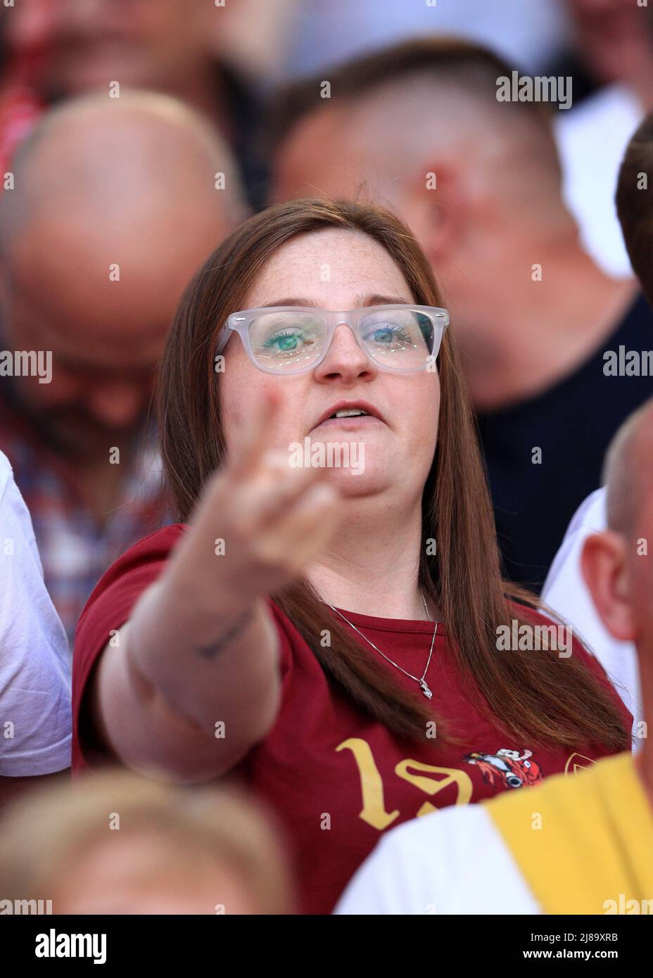 14th May 2022 ; Wembley Stadium, London England; FA Cup Final, Chelsea versus Liverpool: Liverpool fan gesturing rudely as the national anthem of the United Kingdom is played Stock Photo