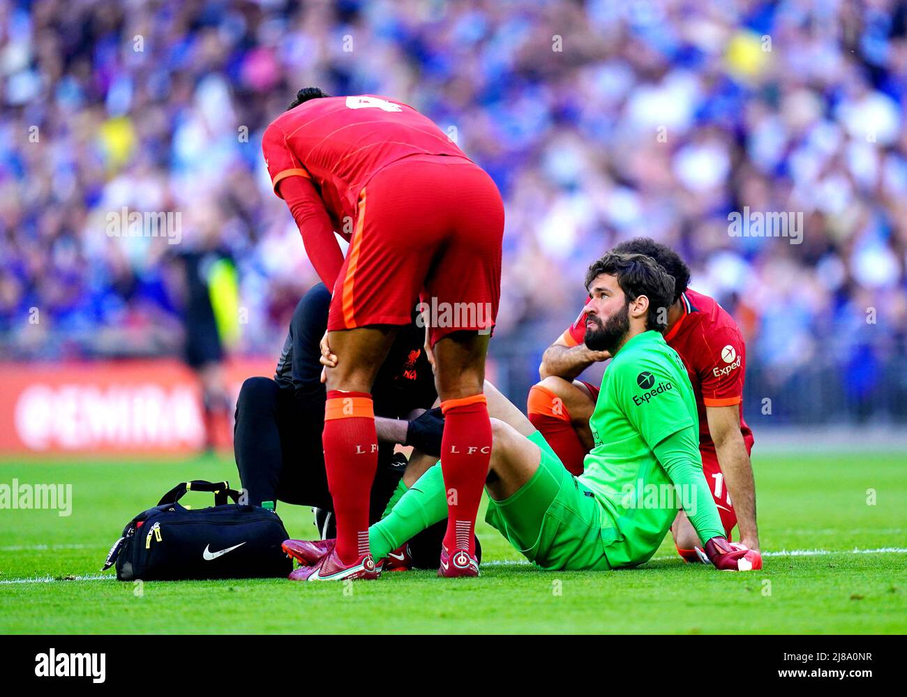 Liverpool Goalkeeper Alisson Receives Treatment After Picking Up An ...