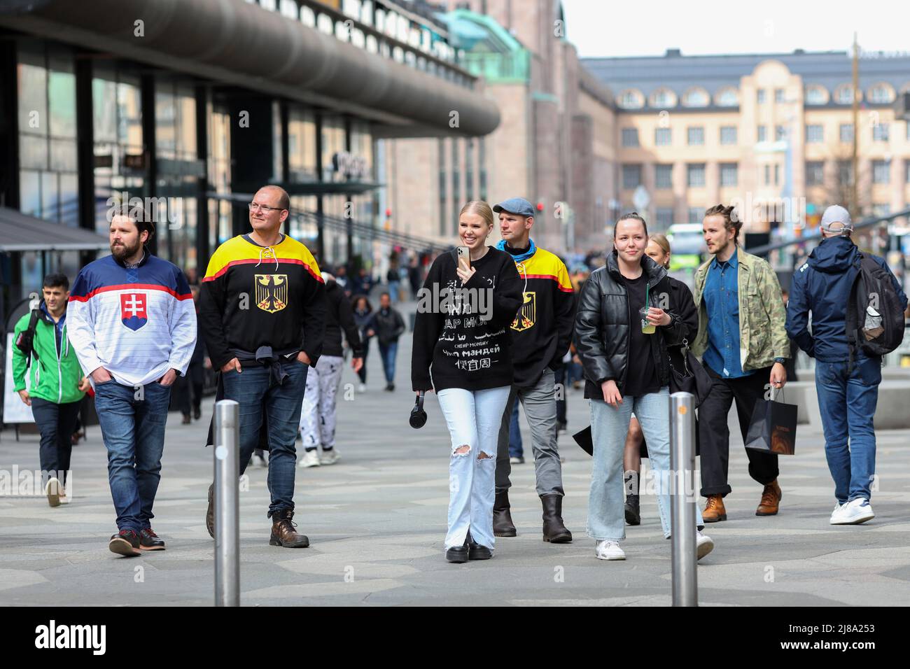 Fans of the German and Slovakian national ice hockey teams seen walking in Helsinki city center. On May 13, the Ice Hockey World Championship 2022 began in Finland. Hockey fans from many countries arrived in Helsinki and Tampere, the citys where the matches will take place. Stock Photo