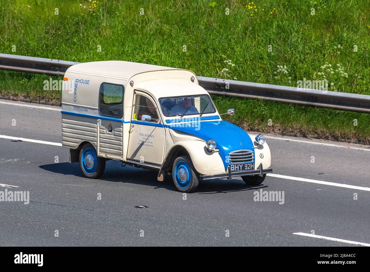 Corner House, Pub Kitchen white blue business van. 1970 70s seventies cream commercial French Citroen 602 cc. A-Series  Petrol van driving on the M6 motorway, UK Stock Photo