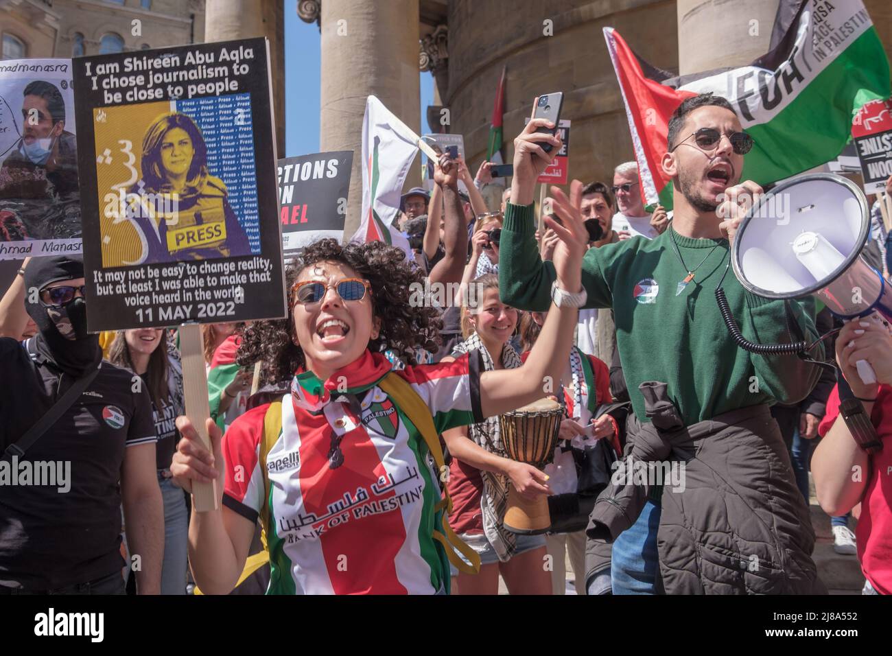 London, UK. 14 May 2022. People march from the BBC to a rally at Downing St against 74 years of Israel's increasing human rights abuse against Palestinians since over 750,000 were displaced from their homes by Zionist Israeli forces. The situation in Israel is now widely recognised internationally as apartheid. Marchers express shock at the attack on the pall-bearers at the funeral of journalist Shireen Abu Akleh, shot in cold blood by Israeli forces. Peter Marshall Alamy Live News Stock Photo