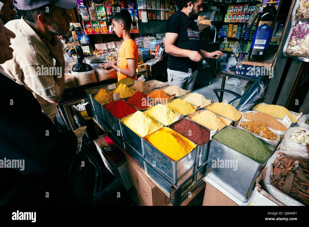 Damascus, Syria -May, 2022: Vendor selling herbals and spices at Suq Al Hamidiyah in Damascus Stock Photo